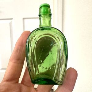 Vintage green glass horseshoe salt shaker
